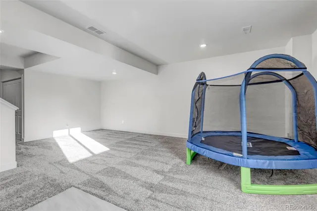 a view of a livingroom with a staircase