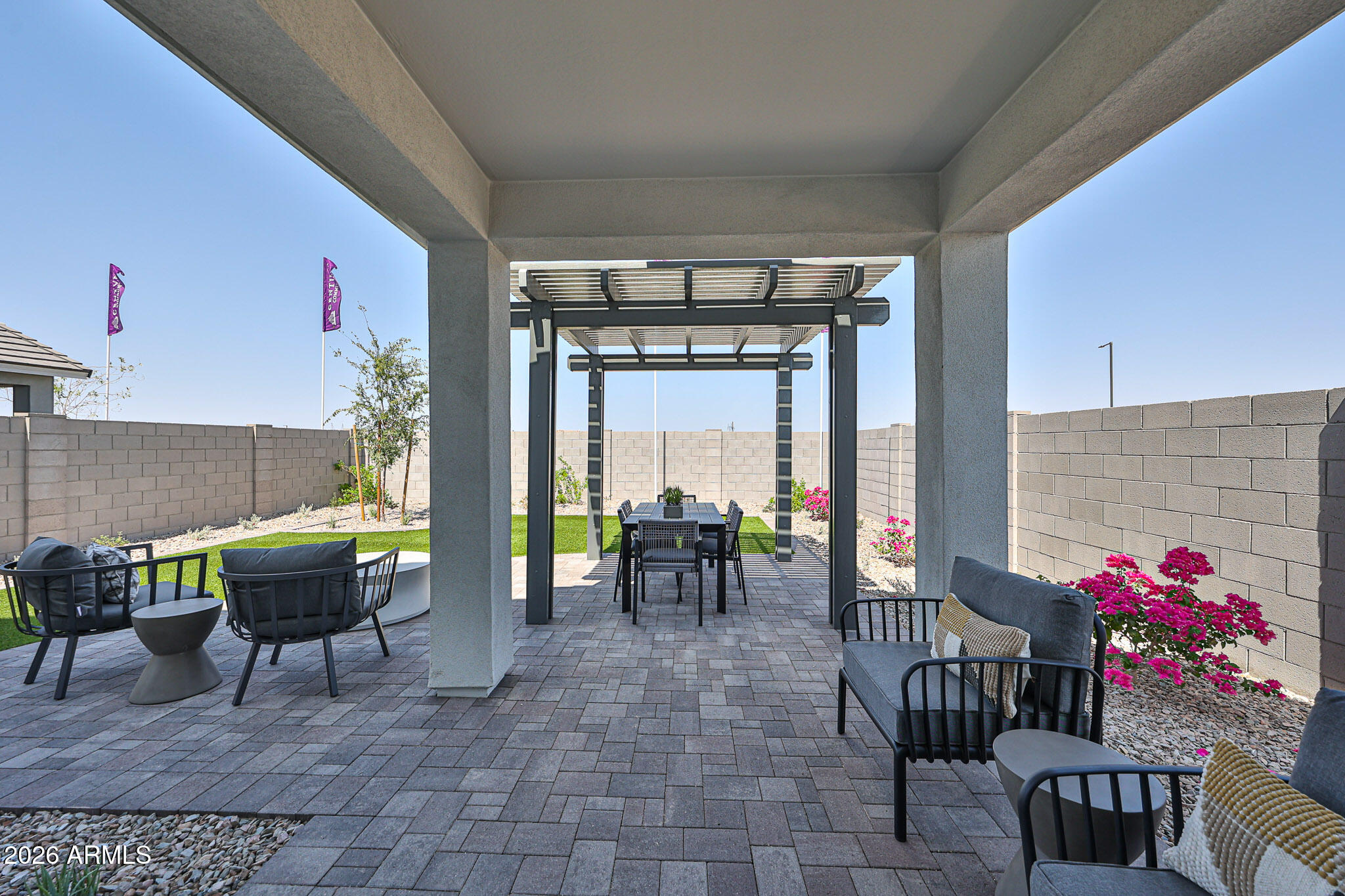 12466 North 305th Avenue Buckeye, AZ 85396 - Photo 23 of 51 a view of a tables and chairs in patio