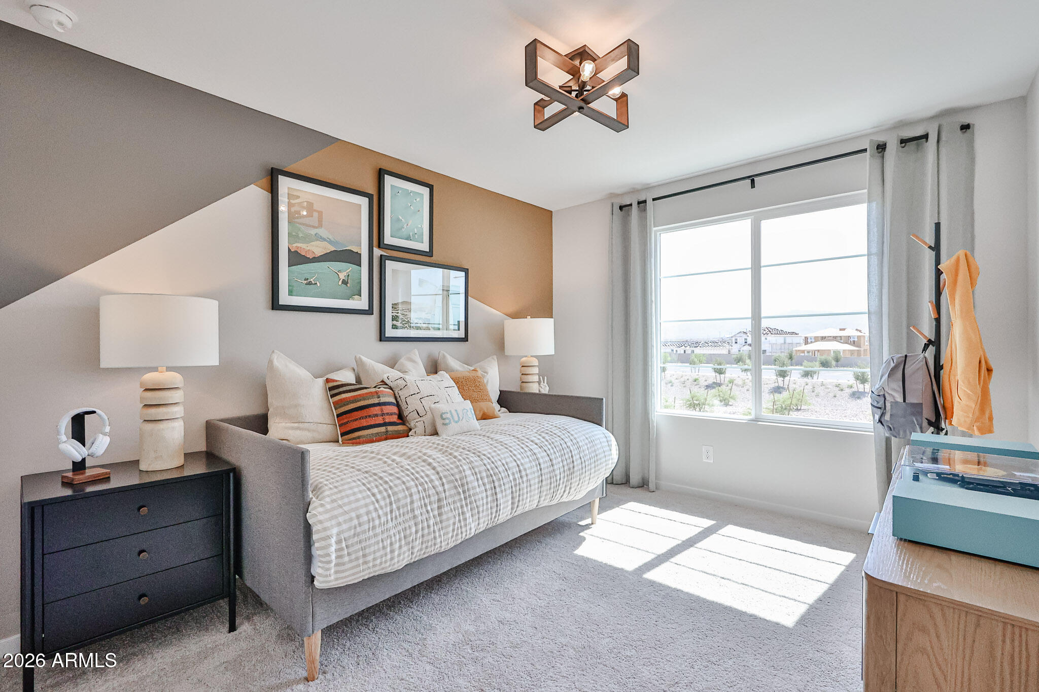 12466 North 305th Avenue Buckeye, AZ 85396 - Photo 26 of 51 a bedroom with a large bed and a window