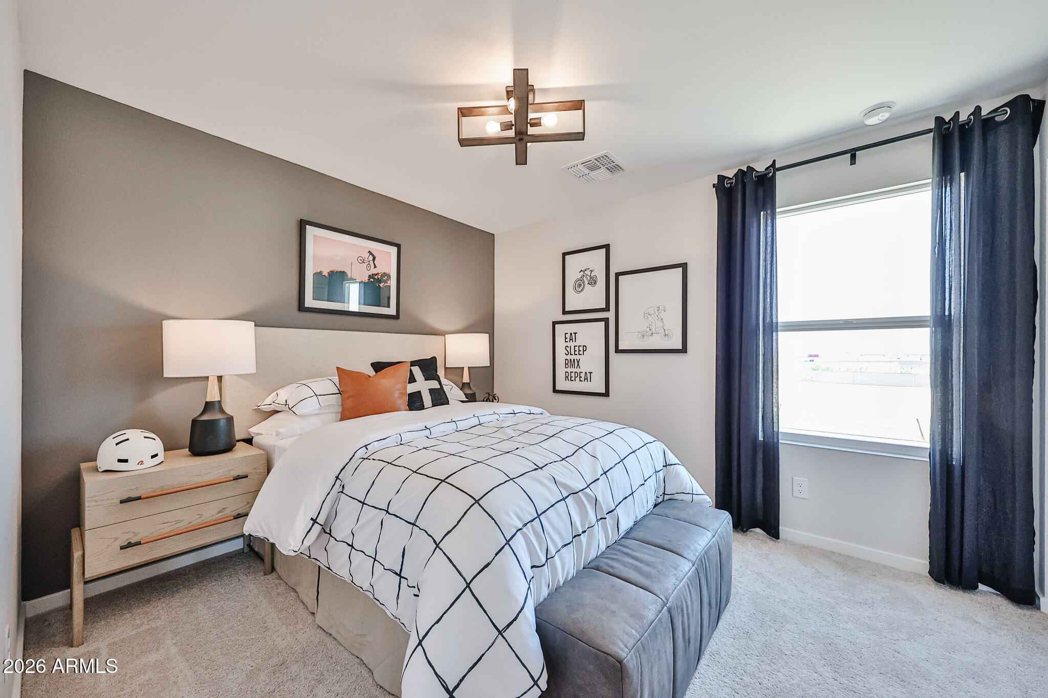 12466 North 305th Avenue Buckeye, AZ 85396 - Photo 27 of 51 a bedroom with a large bed and a window