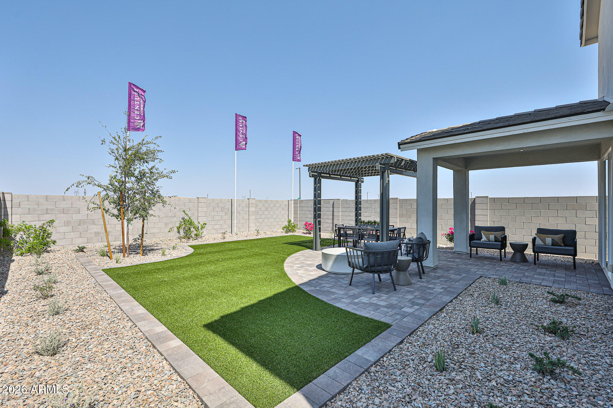 12466 North 305th Avenue Buckeye, AZ 85396 - Photo 32 of 51 a view of a backyard with sitting area
