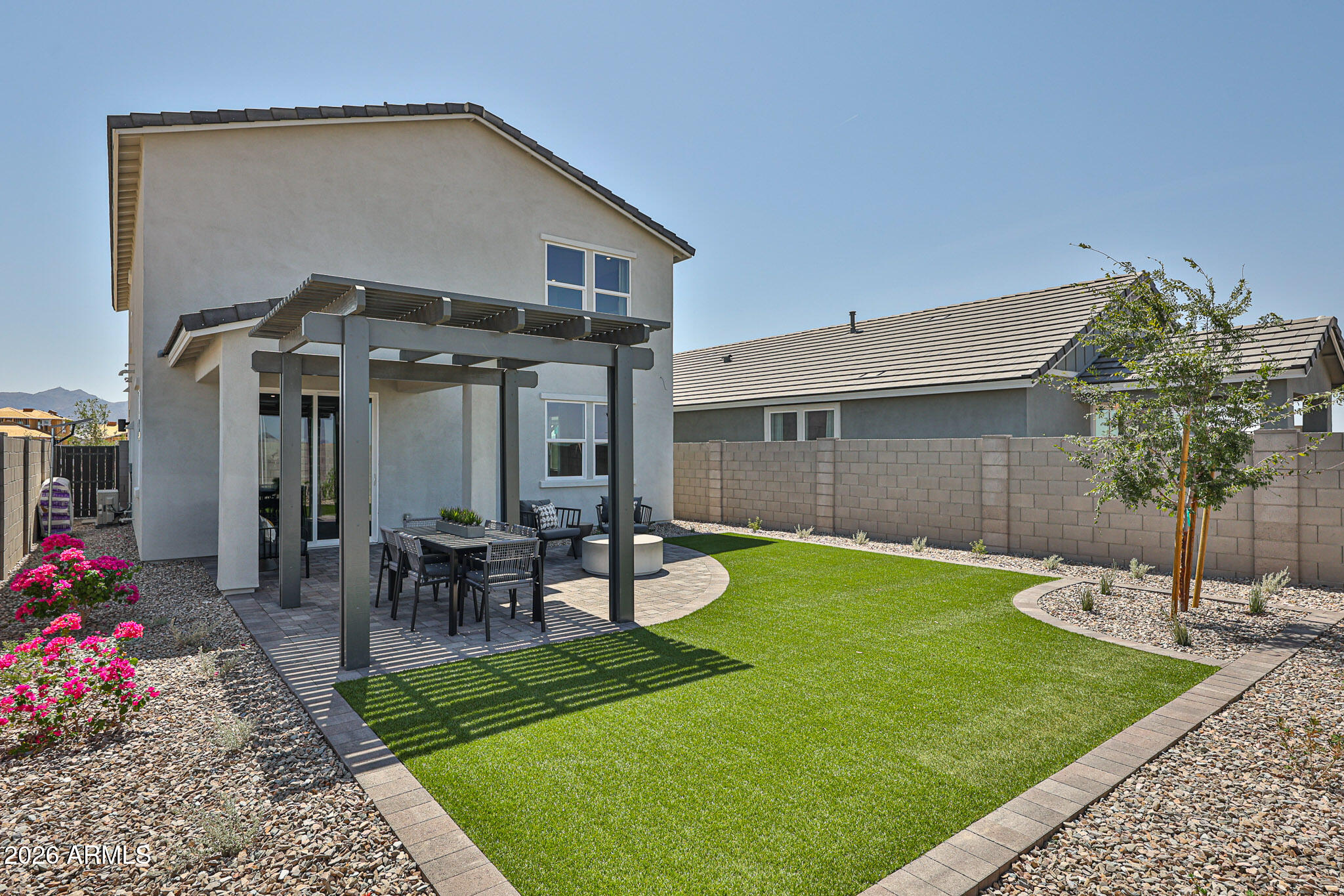 12466 North 305th Avenue Buckeye, AZ 85396 - Photo 34 of 51 a front view of a house with garden
