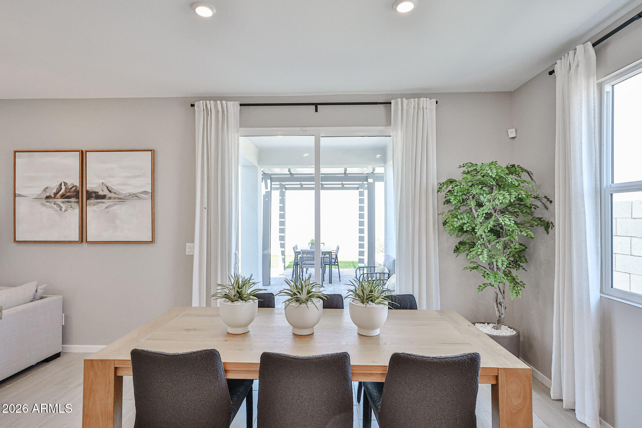 12466 North 305th Avenue Buckeye, AZ 85396 - Photo 36 of 51 a view of a dining room with furniture window and outside view
