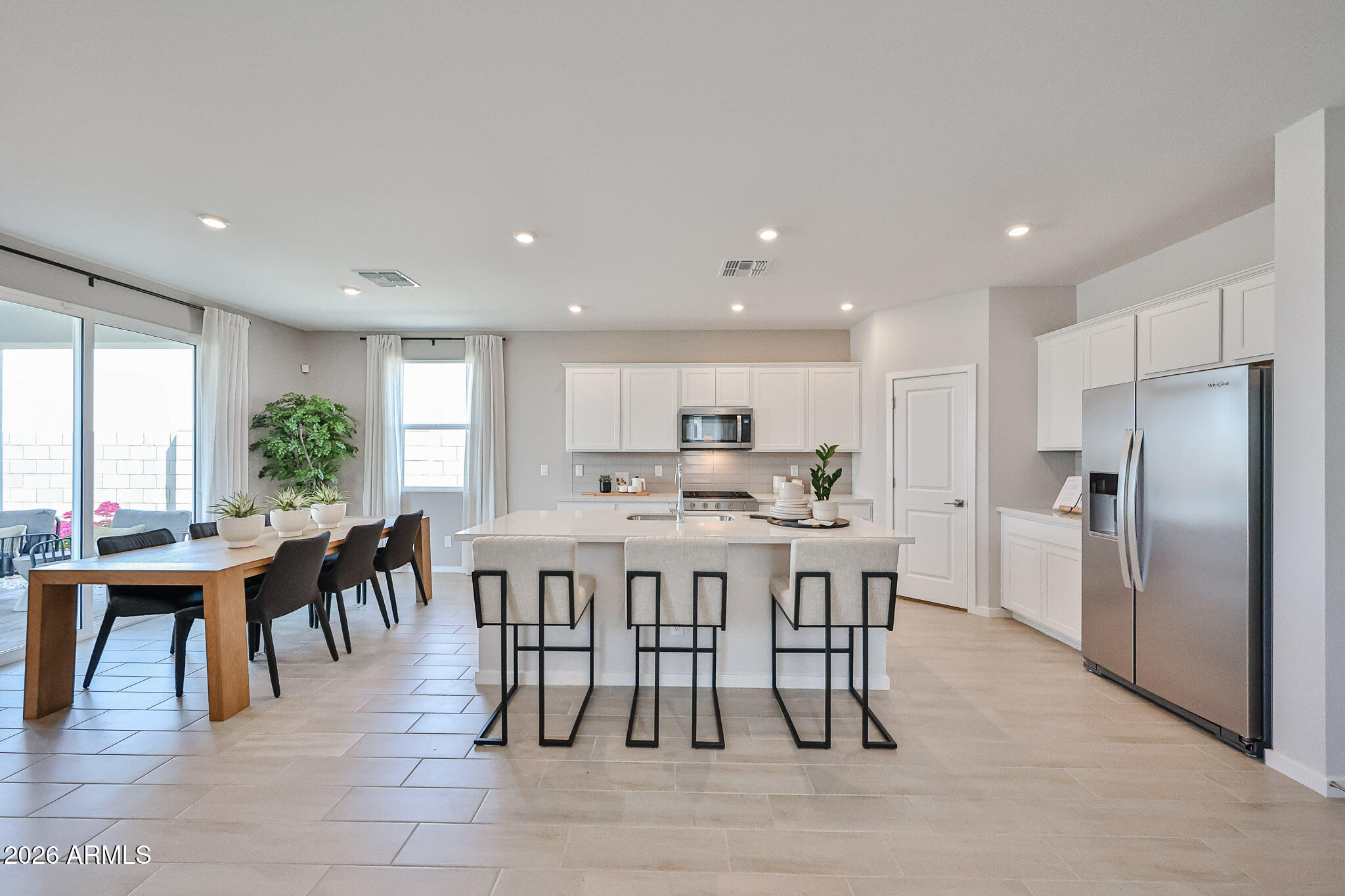 12466 North 305th Avenue Buckeye, AZ 85396 - Photo 43 of 51 a view of a dining room with furniture window and outside view