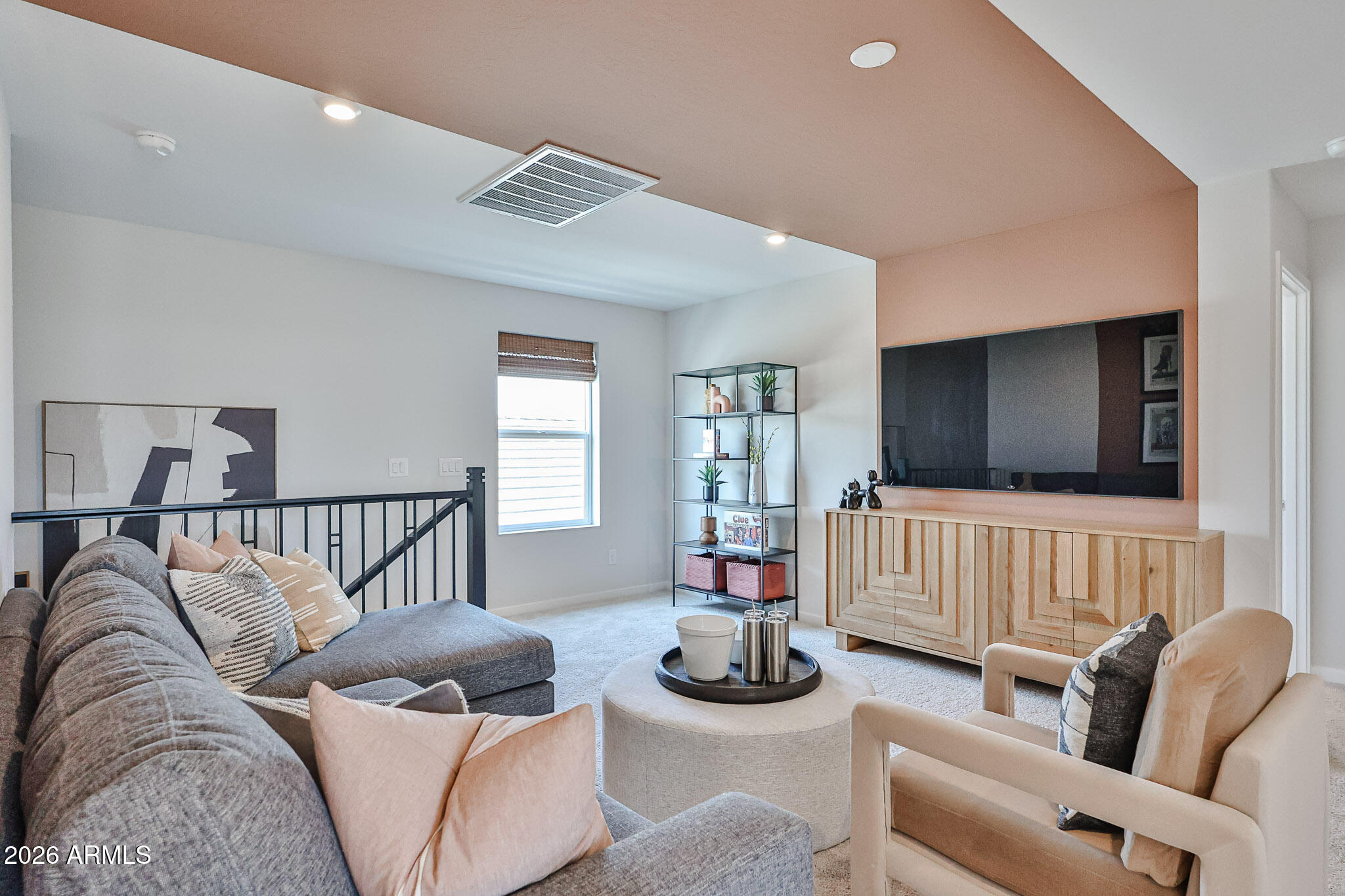 12466 North 305th Avenue Buckeye, AZ 85396 - Photo 48 of 51 a living room with furniture and a flat screen tv