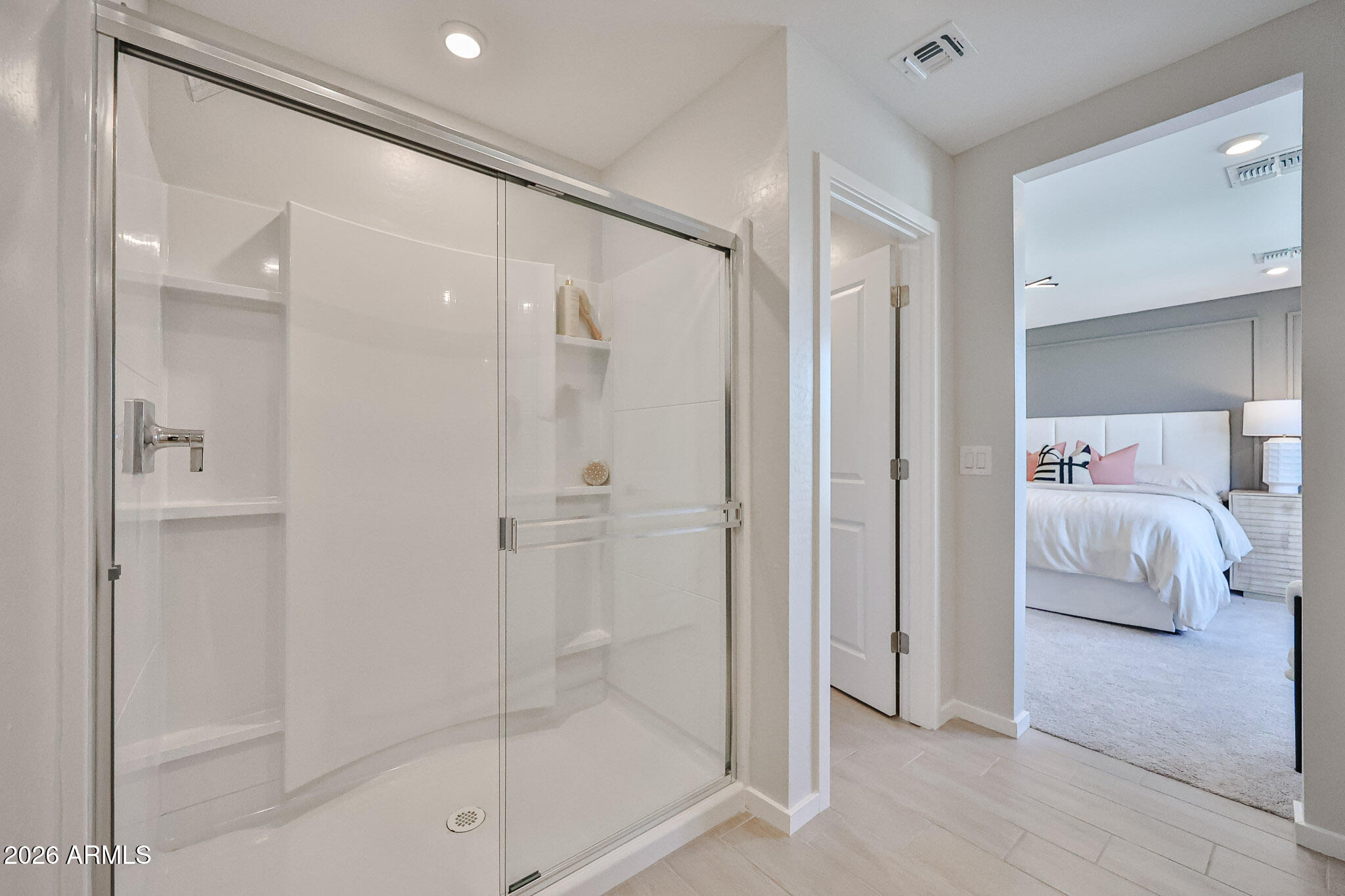 12466 North 305th Avenue Buckeye, AZ 85396 - Photo 49 of 51 a bathroom with a bathtub shower and a sink