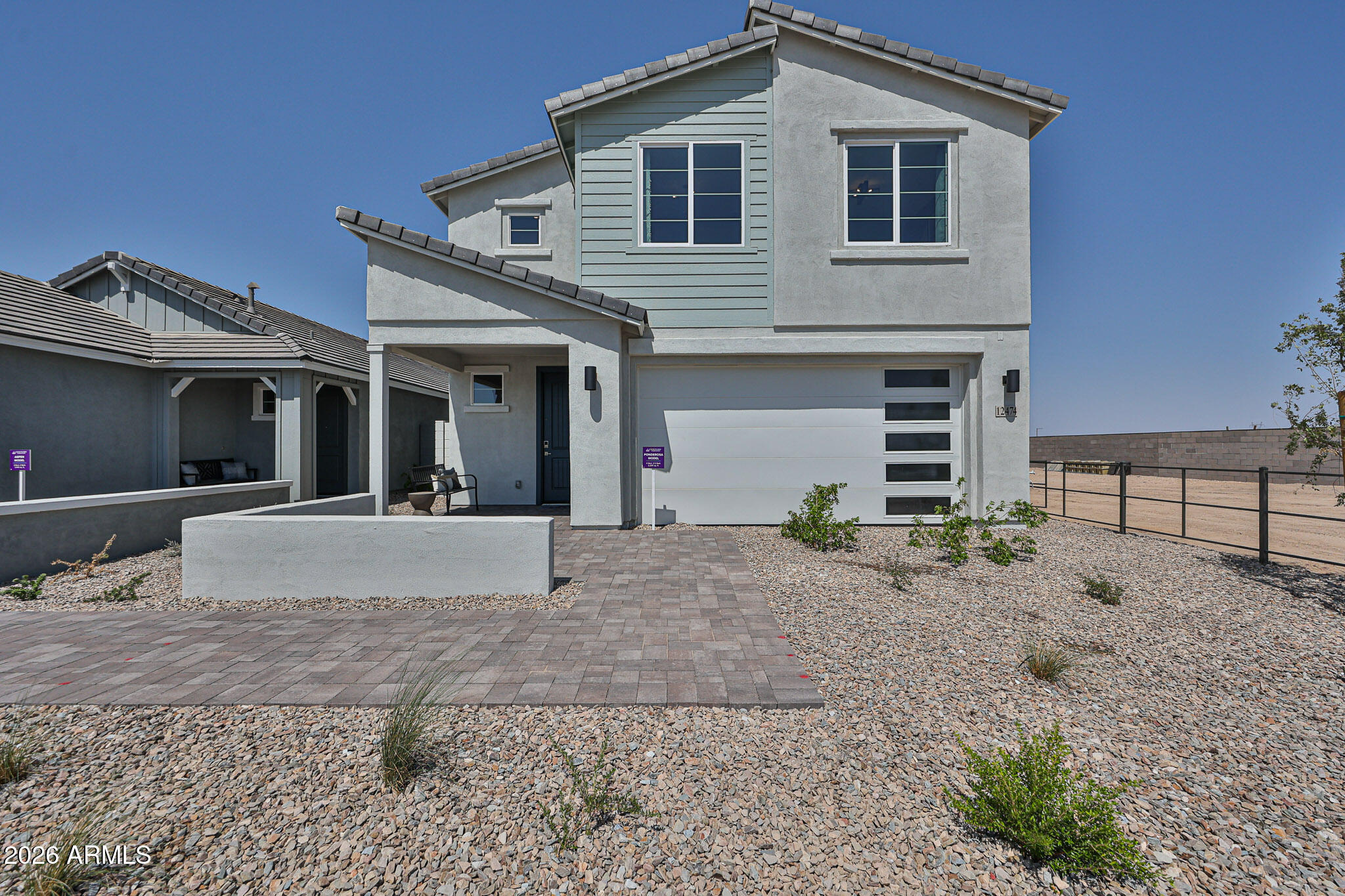 12466 North 305th Avenue Buckeye, AZ 85396 - Photo 6 of 51 a view of a house with a yard