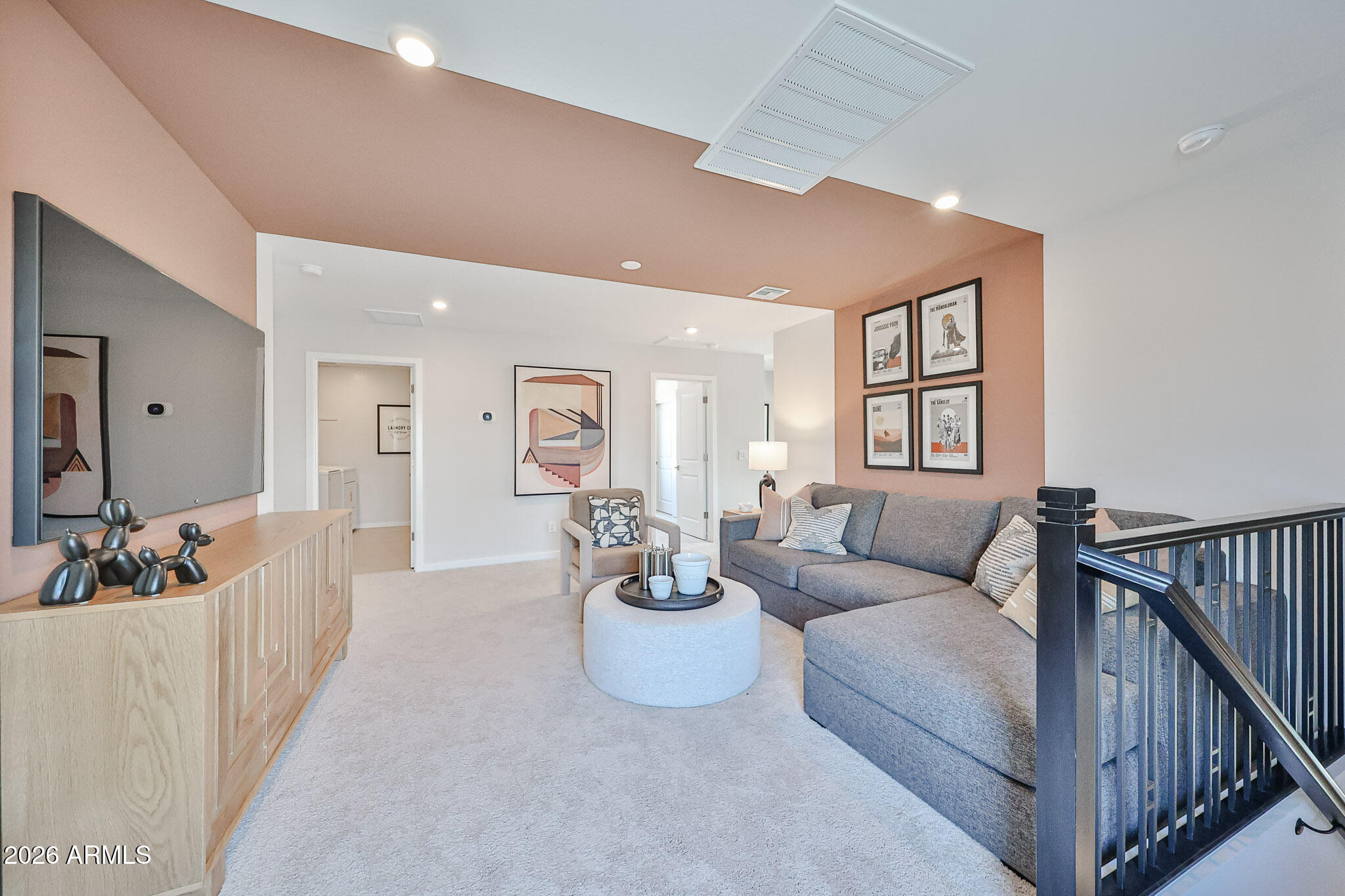 12466 North 305th Avenue Buckeye, AZ 85396 - Photo 9 of 51 a living room with furniture and a potted plant