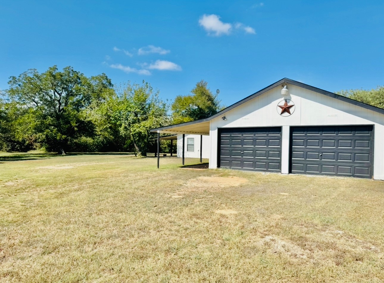 702 Pleasant Grove Road Elgin, TX 78621 - Photo 4 of 38 View of detached garage