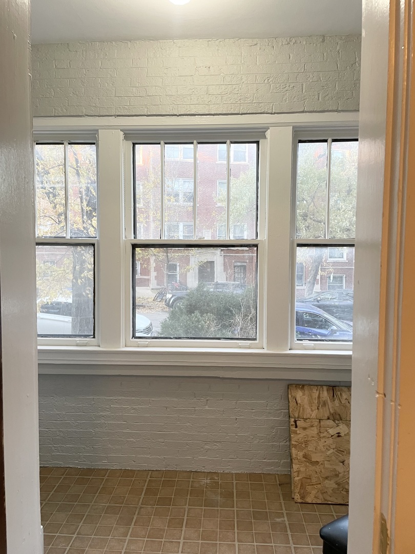 7077 North Ridge Boulevard, Unit 1S Chicago, IL 60645 - Photo 11 of 17 a view of a window in a room