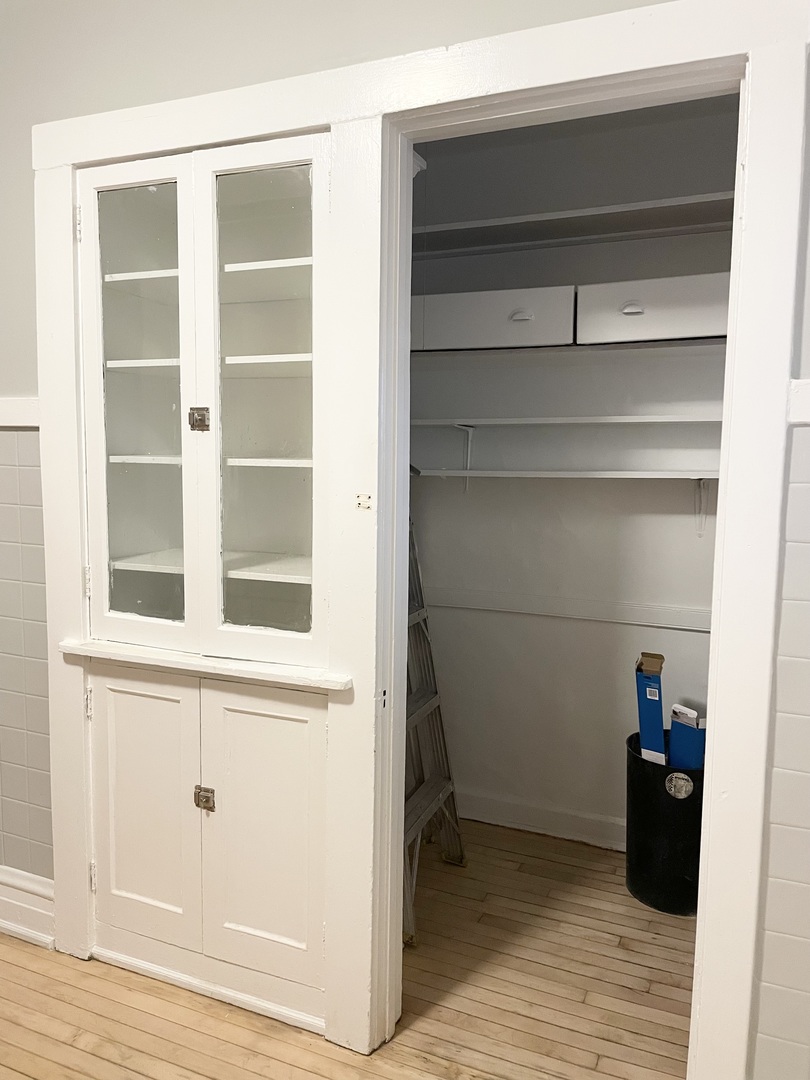7077 North Ridge Boulevard, Unit 1S Chicago, IL 60645 - Photo 13 of 17 a view of walk in closet with empty racks