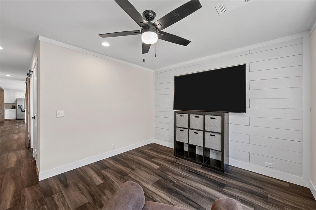 3050 Clater Powell Road Waco, TX 76705 - Photo 25 of 39 a view of a livingroom with a flat screen tv