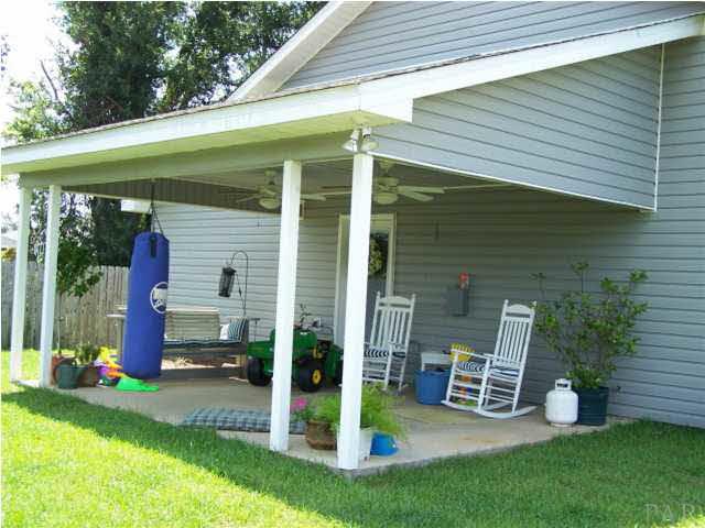 4022 Omega Street Pace, FL 32571 - Photo 14 of 15 COVERED BACK PORCH
