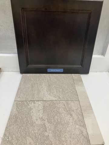 a sign that is sitting on a wooden bench