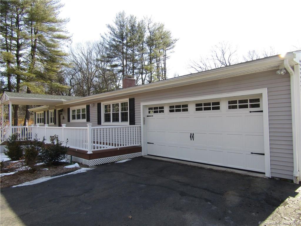 119 Country Club Road Avon, CT 06001 - Photo 1 of 1 front view of a house with a street