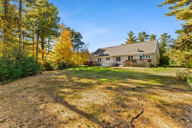 a view of a house with a big yard