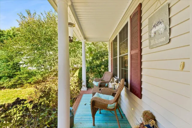 a view of balcony with furniture