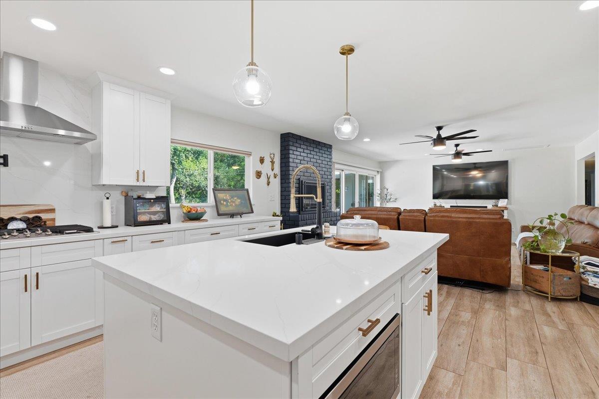 4849 Alexon Way Carmichael, CA 95608 - Photo 16 of 50 a kitchen with a stove a sink and a refrigerator