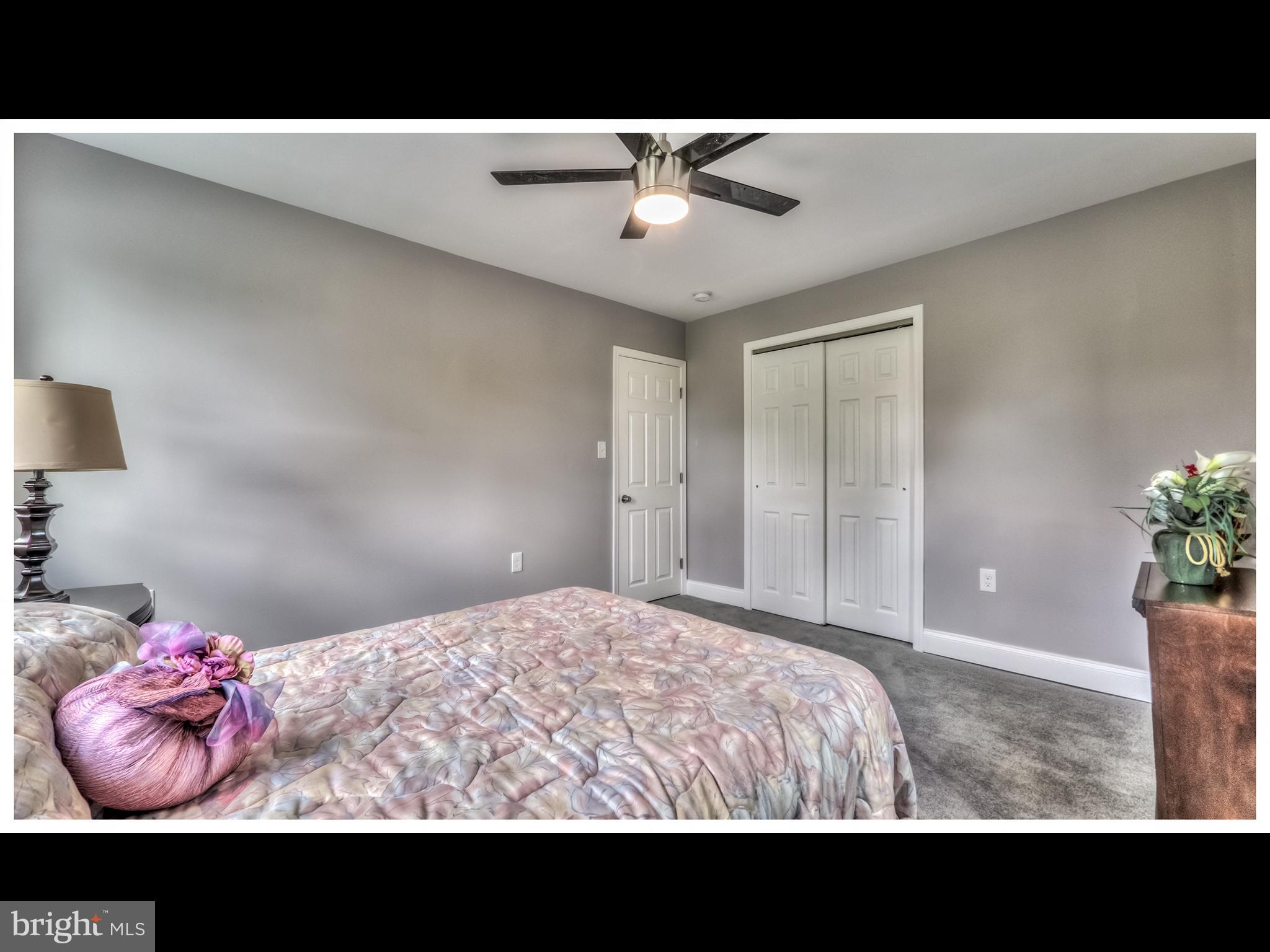 5932 Hillen Road Baltimore, MD 21239 - Photo 12 of 23 a view of bedroom with a bed