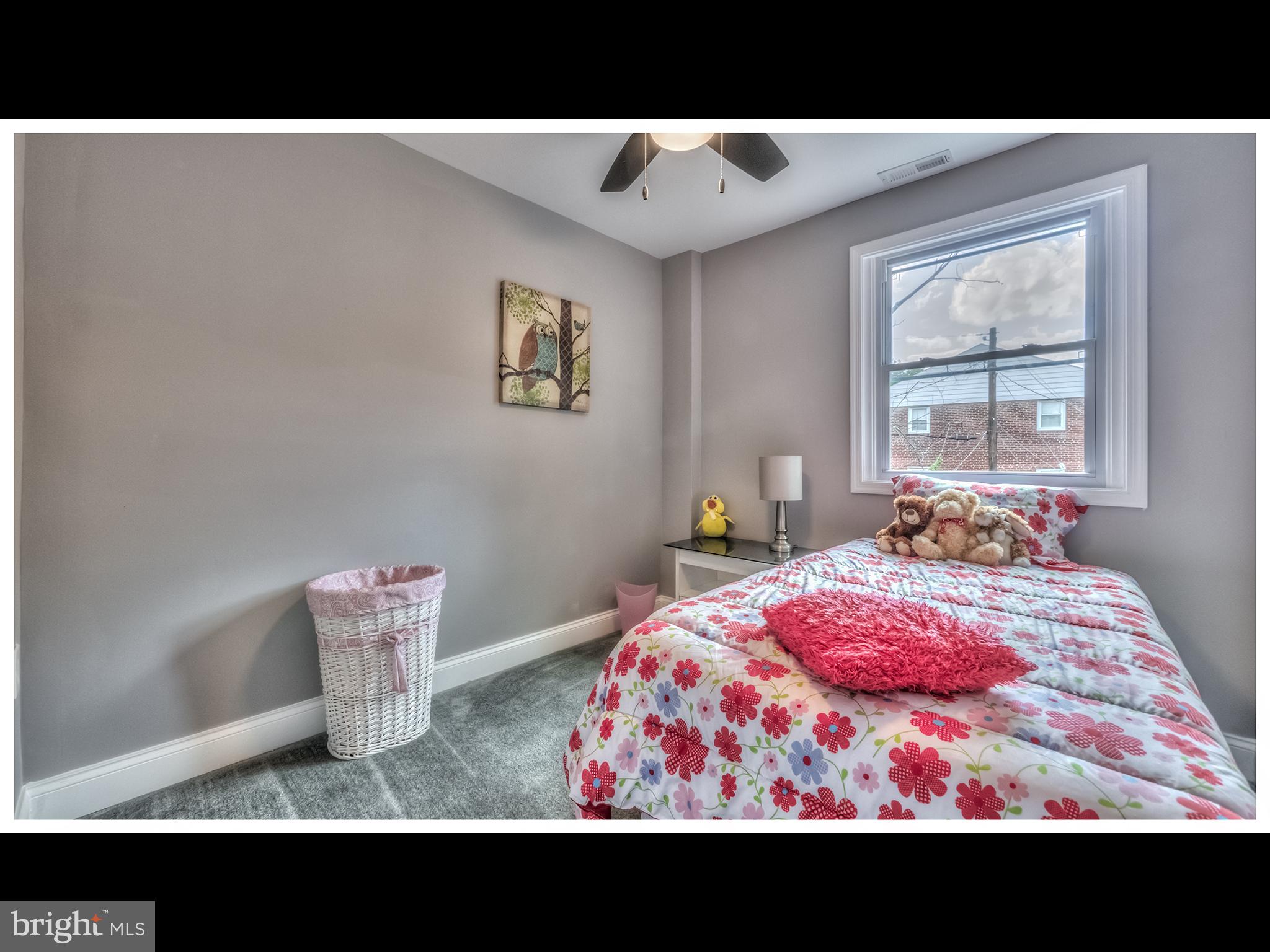 5932 Hillen Road Baltimore, MD 21239 - Photo 15 of 23 a view of living room and window