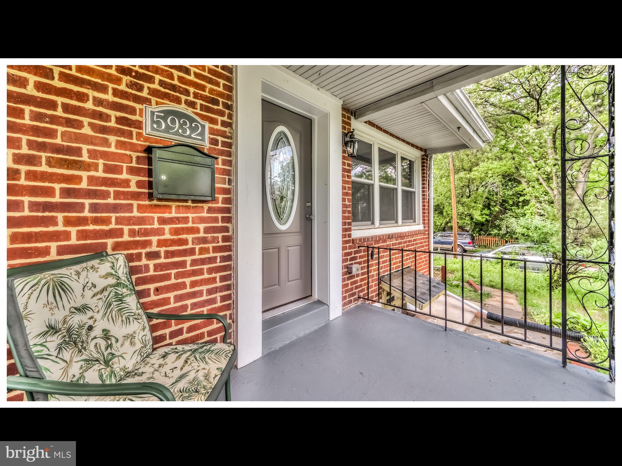 5932 Hillen Road Baltimore, MD 21239 - Photo 4 of 23 a view of a house with a outdoor space