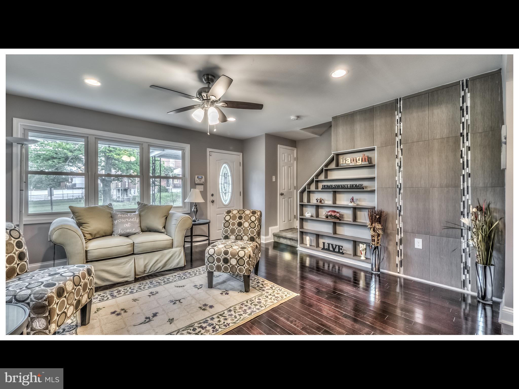 5932 Hillen Road Baltimore, MD 21239 - Photo 5 of 23 a view of living room and dining room