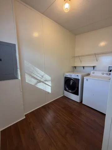 a utility room with washer and dryer