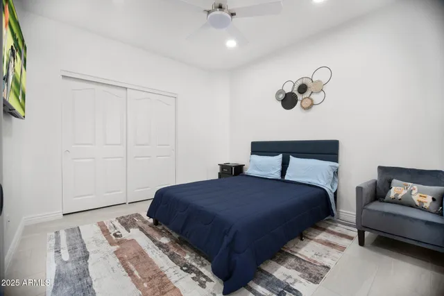 a view of a dining room with furniture and window