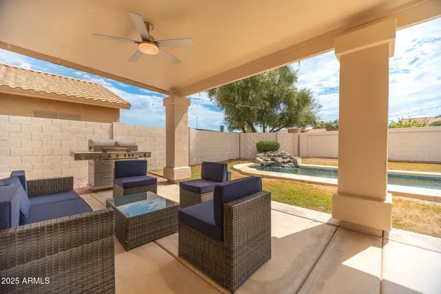 a view of backyard of a house