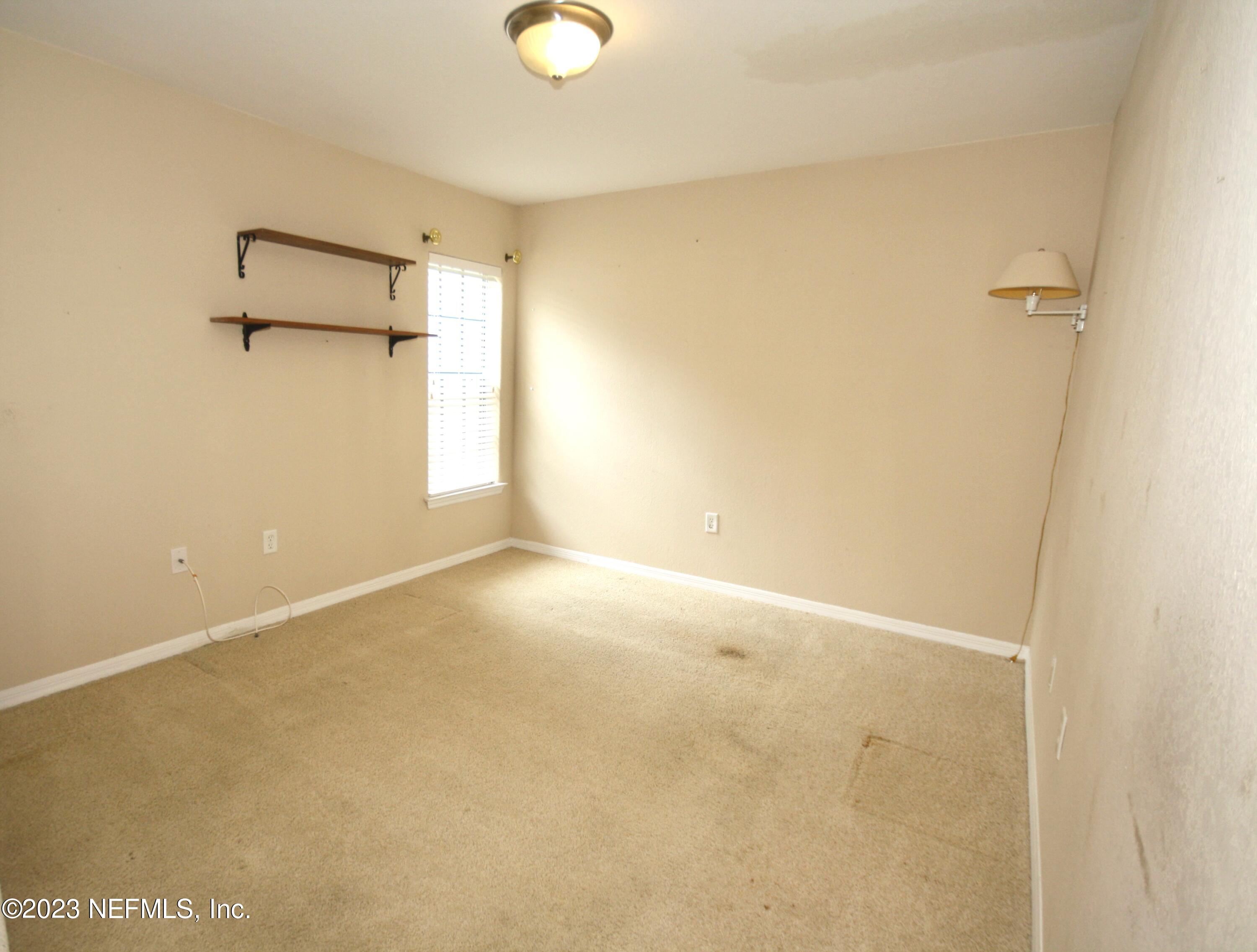 10150 Belle Rive Boulevard, Unit 2303 Jacksonville, FL 32256 - Photo 12 of 28 a view of an empty room
