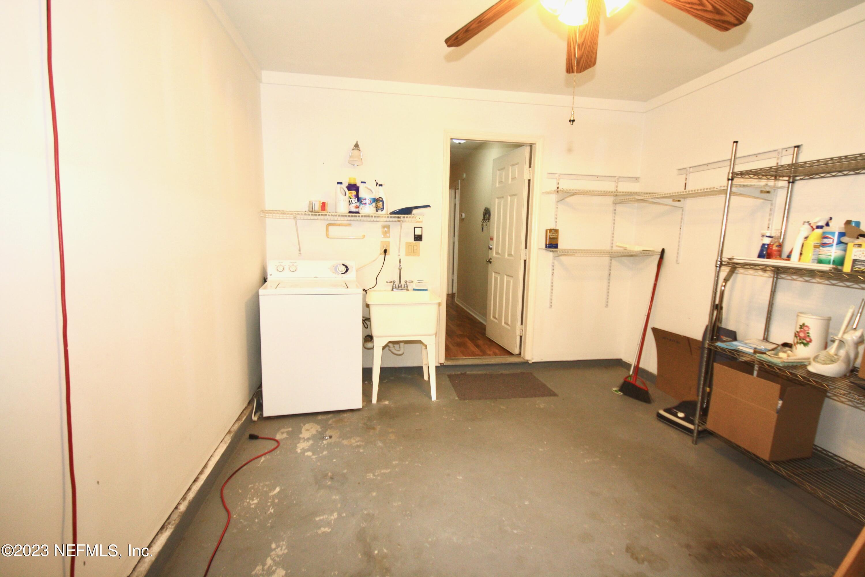 10150 Belle Rive Boulevard, Unit 2303 Jacksonville, FL 32256 - Photo 19 of 28 a view of a room with utility room