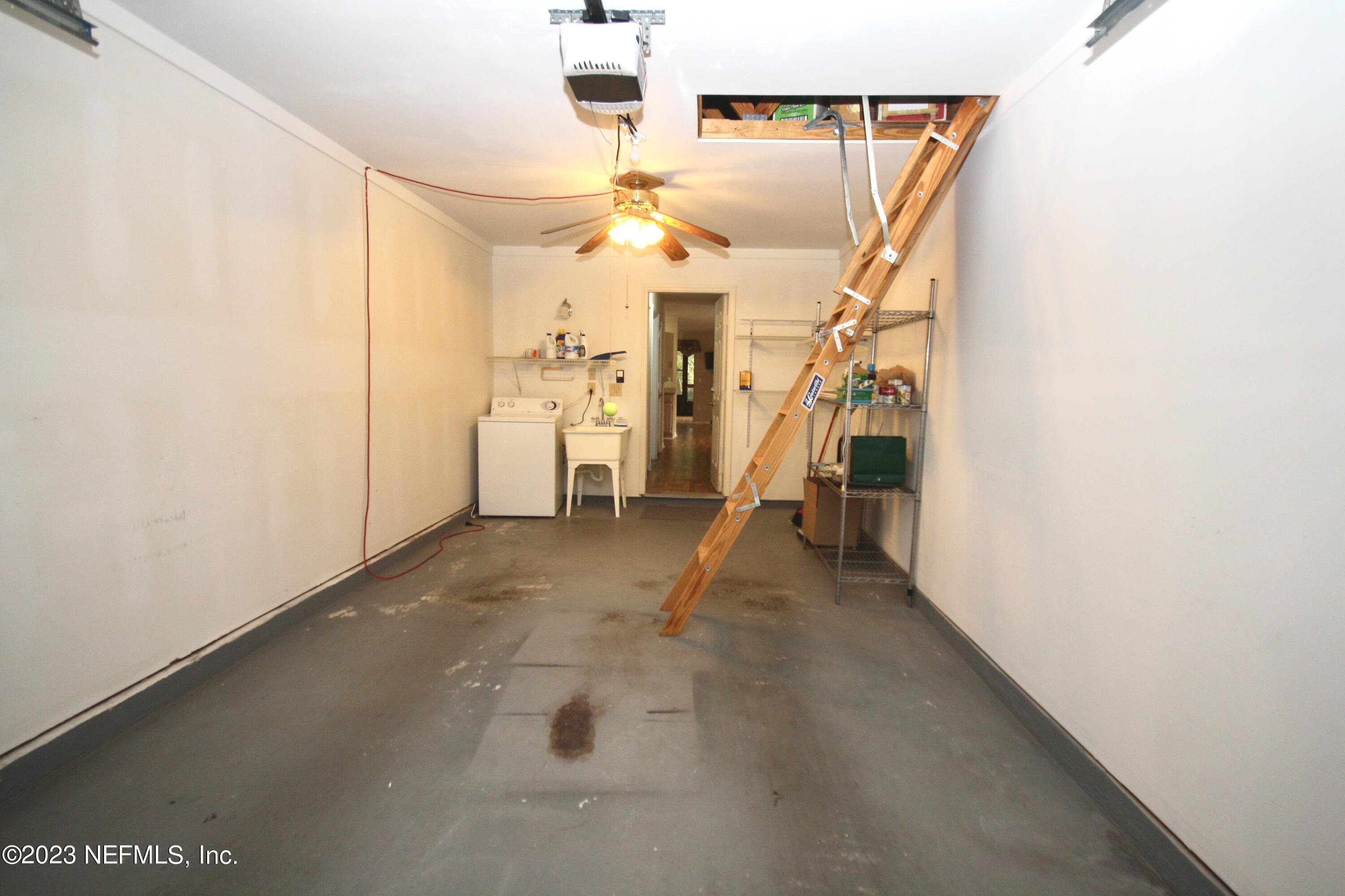 10150 Belle Rive Boulevard, Unit 2303 Jacksonville, FL 32256 - Photo 20 of 28 a view of a room with utility room