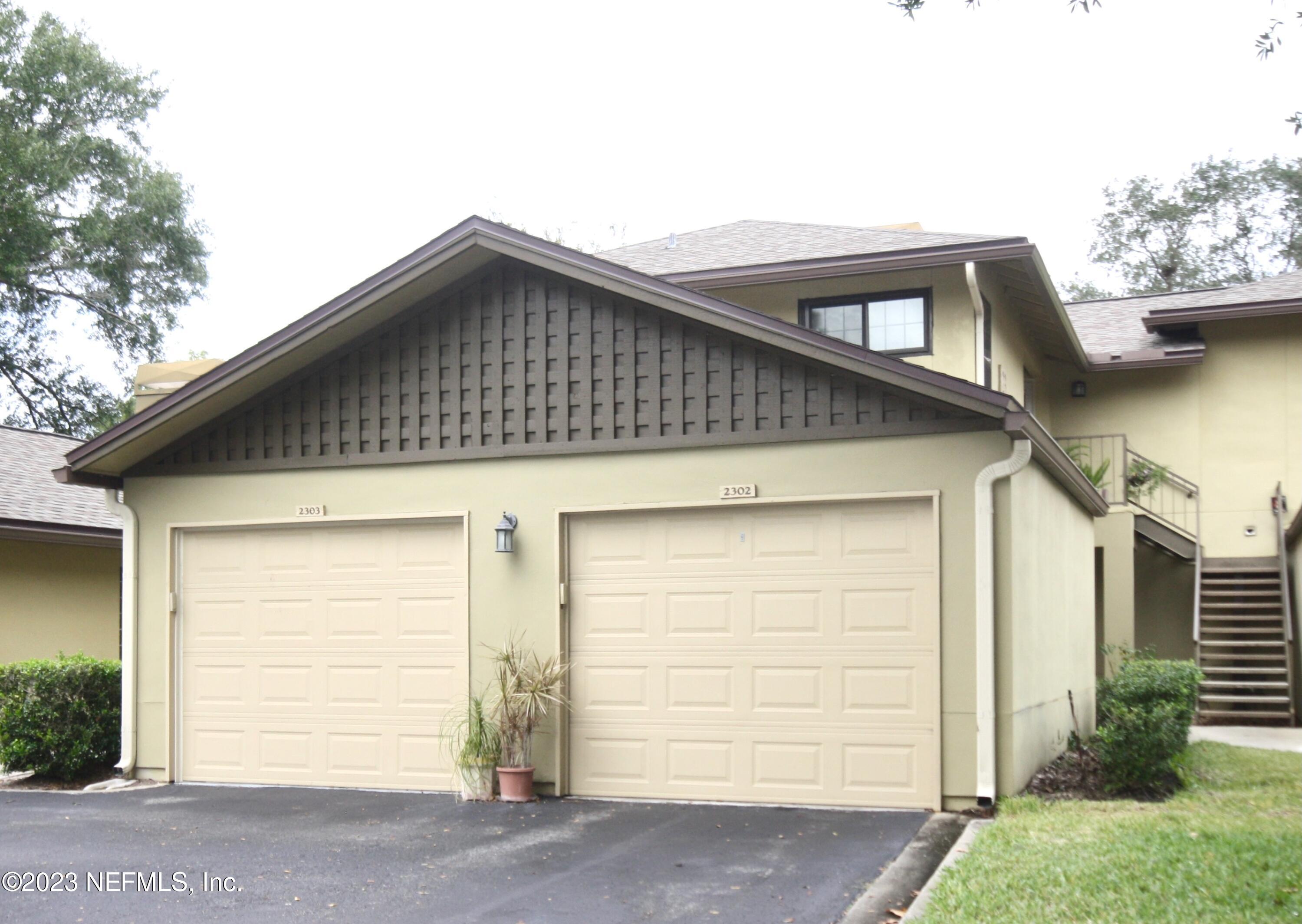 10150 Belle Rive Boulevard, Unit 2303 Jacksonville, FL 32256 - Photo 24 of 28 a front view of a house
