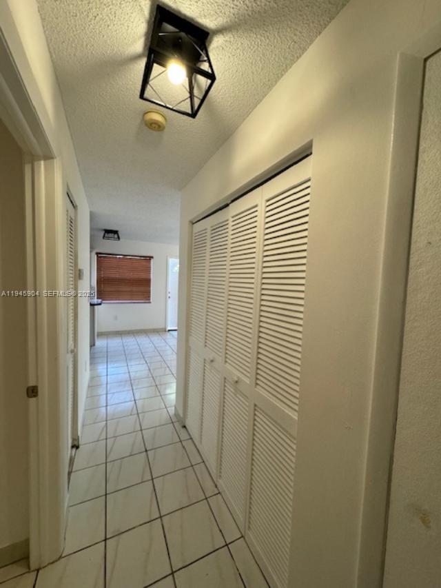 1045 Southwest 122nd Court Miami, FL 33184 - Photo 21 of 44 a bathroom with a shower