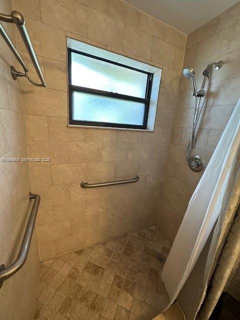 1045 Southwest 122nd Court Miami, FL 33184 - Photo 26 of 44 a bathroom with a shower