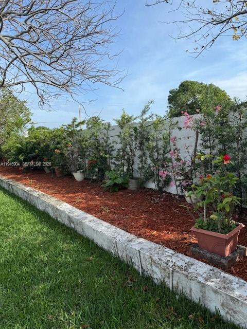 1045 Southwest 122nd Court Miami, FL 33184 - Photo 41 of 44 a view of a yard with an tree