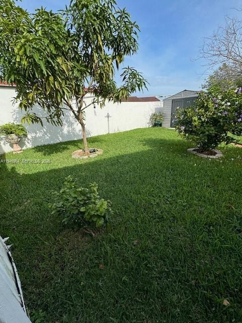 1045 Southwest 122nd Court Miami, FL 33184 - Photo 44 of 44 a view of yard with green space