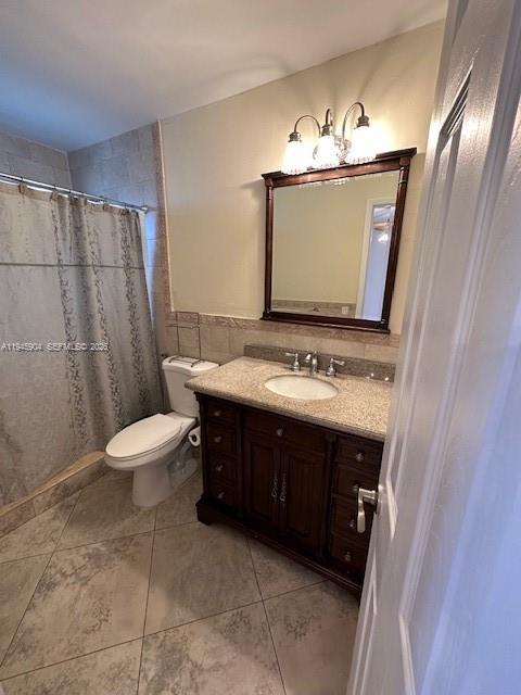 1045 Southwest 122nd Court Miami, FL 33184 - Photo 7 of 44 a bathroom with a sink and a mirror