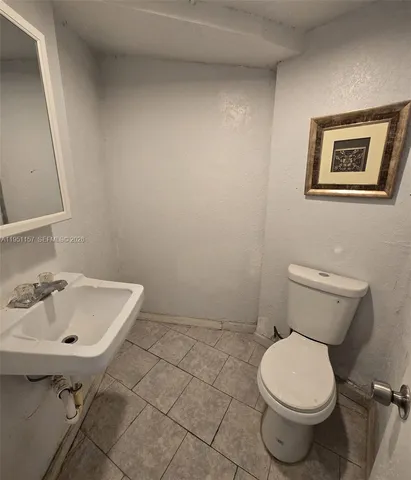 a bathroom with a sink and a toilet
