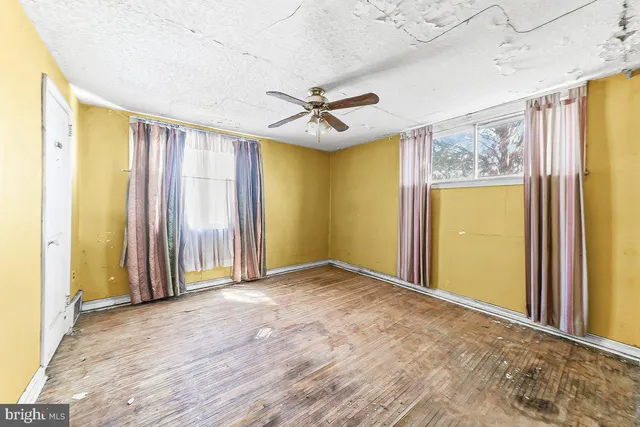 a view of a big room with wooden floor