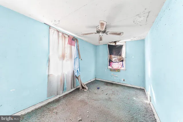 a view of a hallway with a chandelier