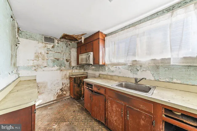 a view of a room with window and washer