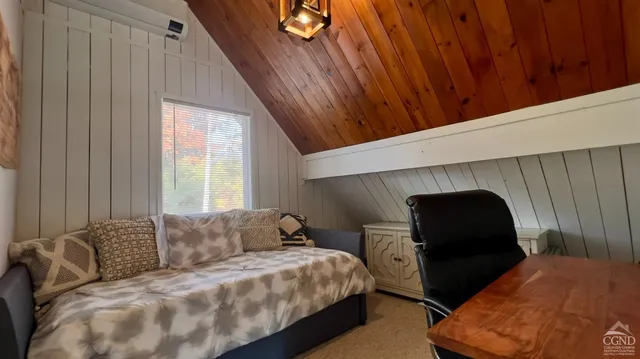 a bathroom with a sink toilet and a mirror