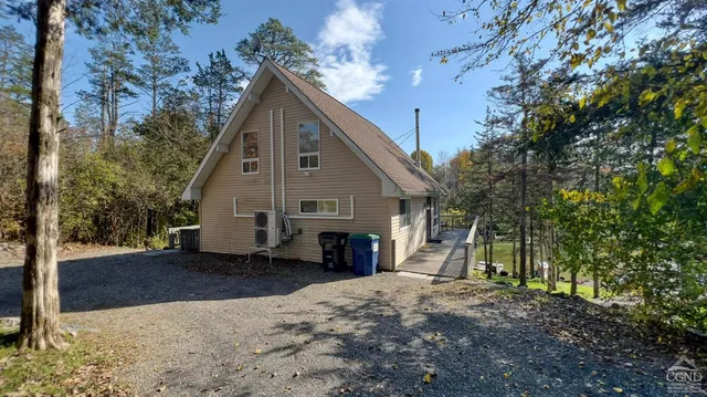 a view of a park with large trees
