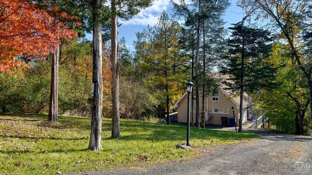 a balcony with view of the house