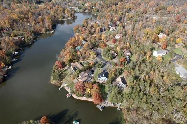 a very nice looking living room with furniture and a large window
