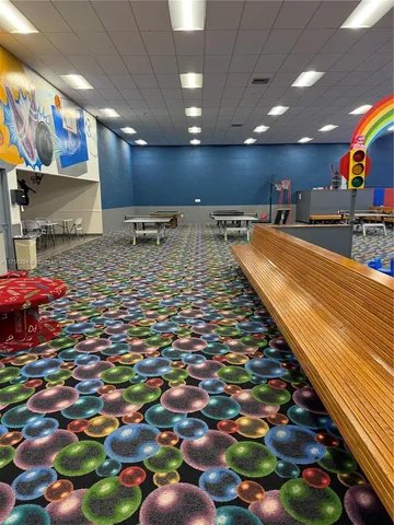 a large room with lots of lights