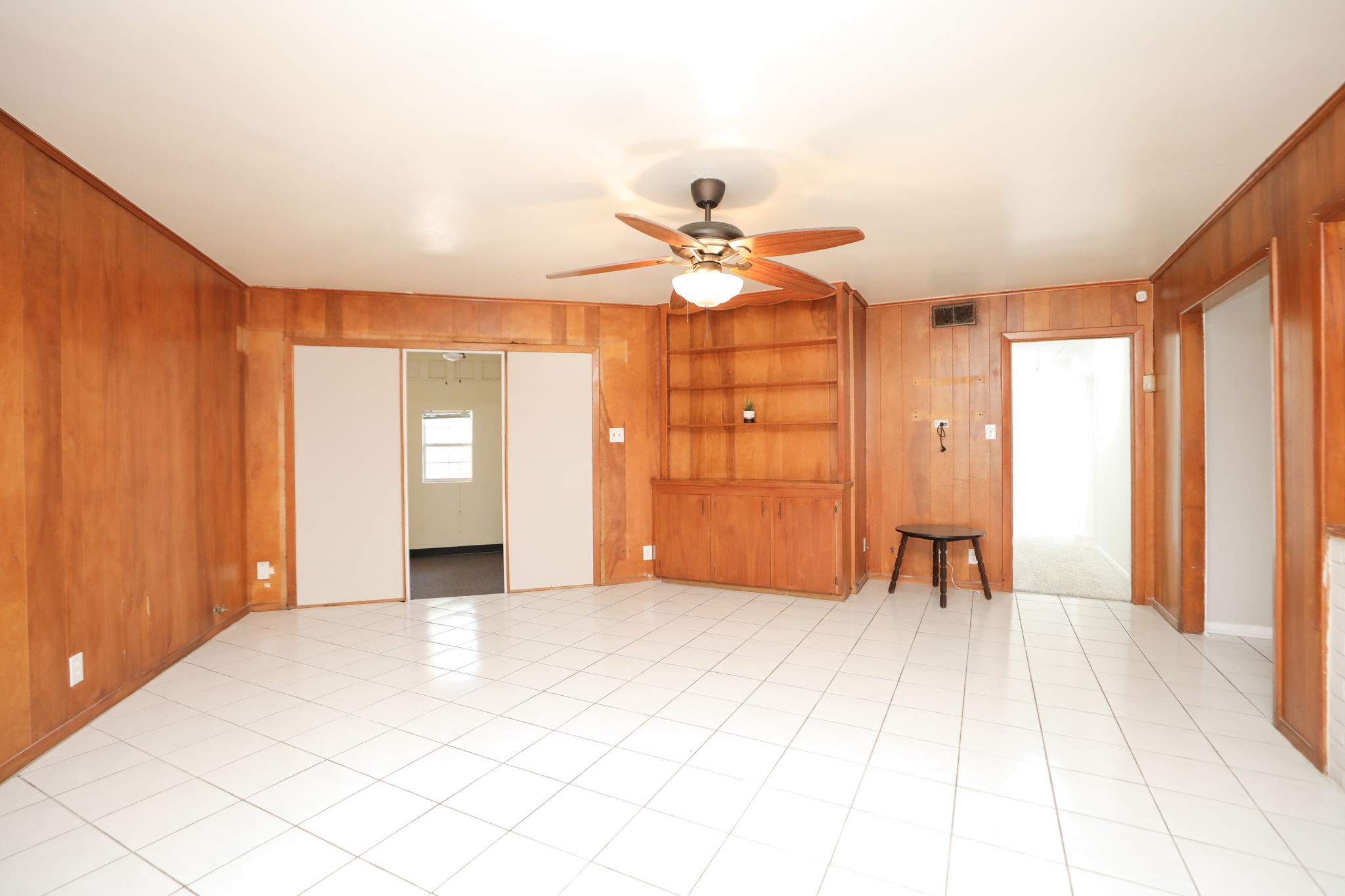 8235 Dover Street Houston, TX 77061 - Photo 11 of 36 a view of an empty room with a window