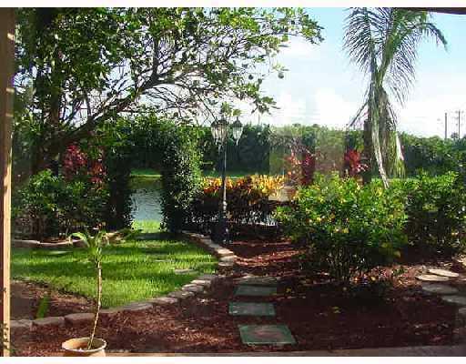 9067 Long Lake Palm Drive Boca Raton, FL 33496 - Photo 3 of 16 Garden & Lake View