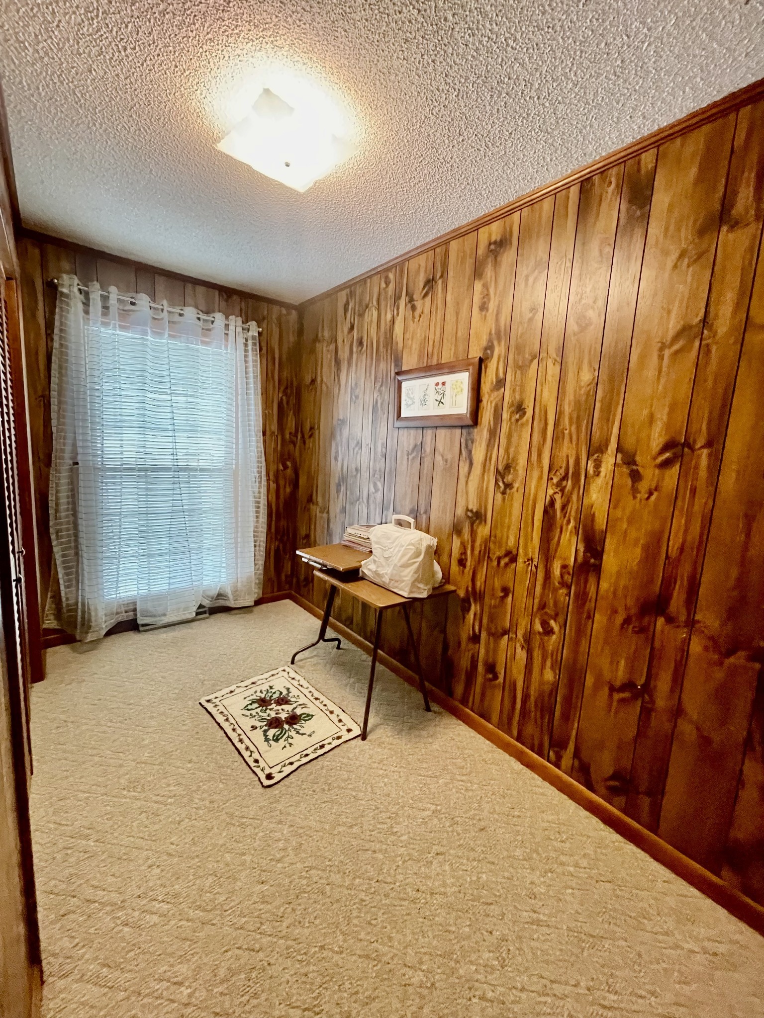 336 Second Creek Road Five Points, TN 38457 - Photo 20 of 37 a living room with a couch and a table